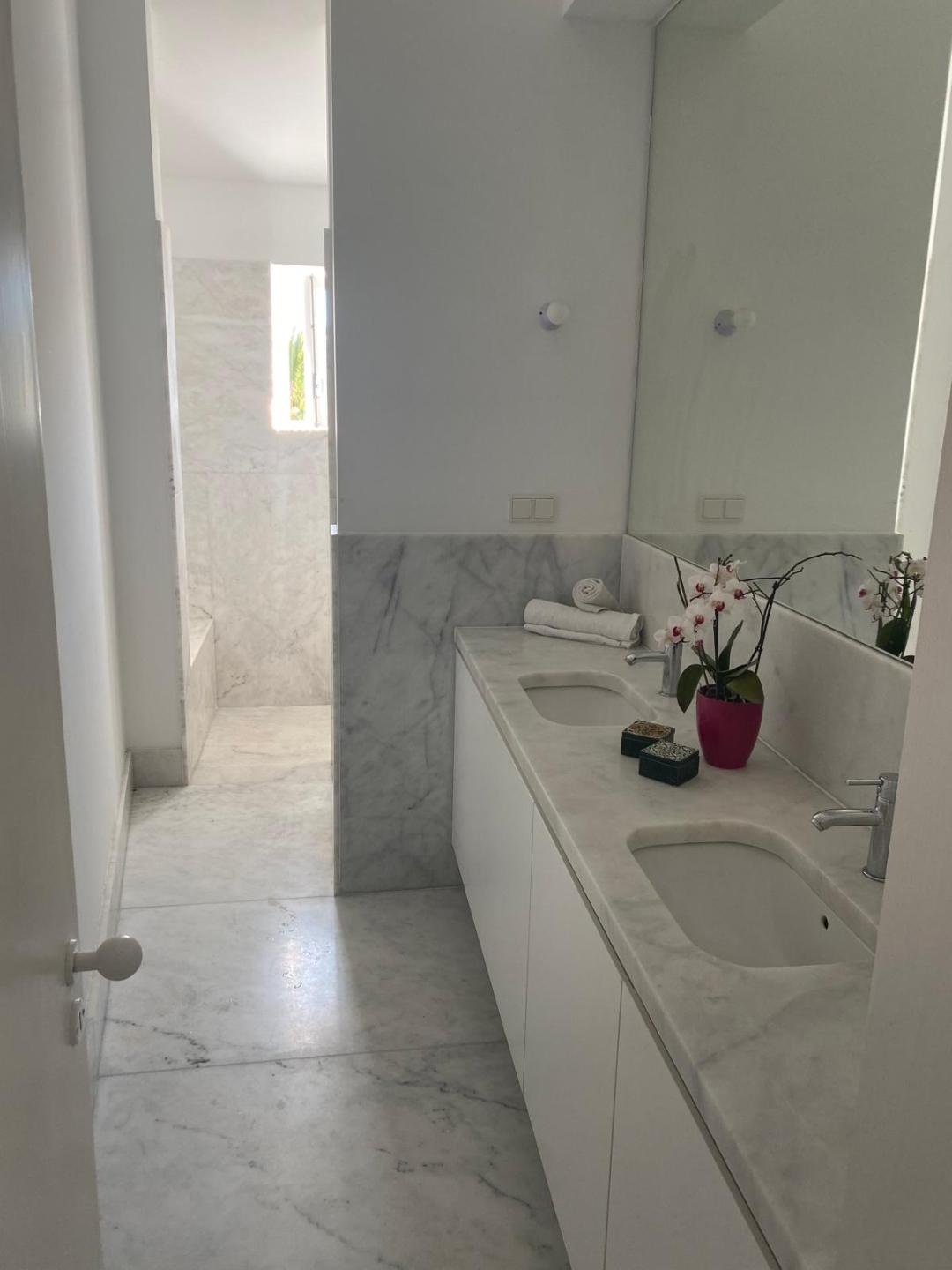 Private marble bathroom on the right